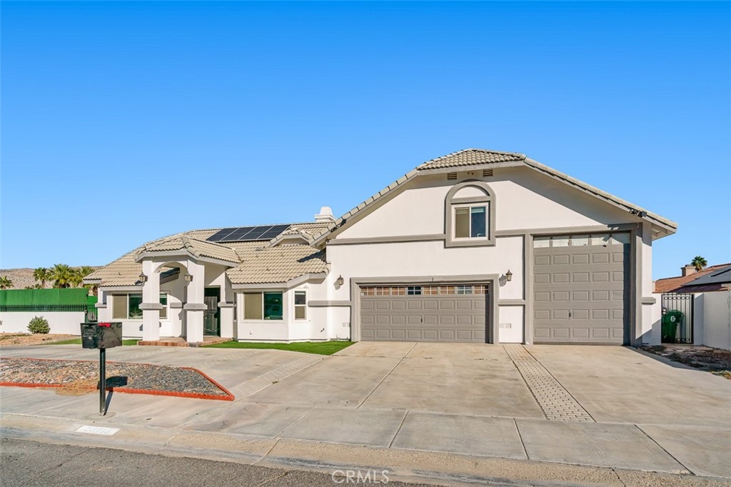 a front view of a house with a garage