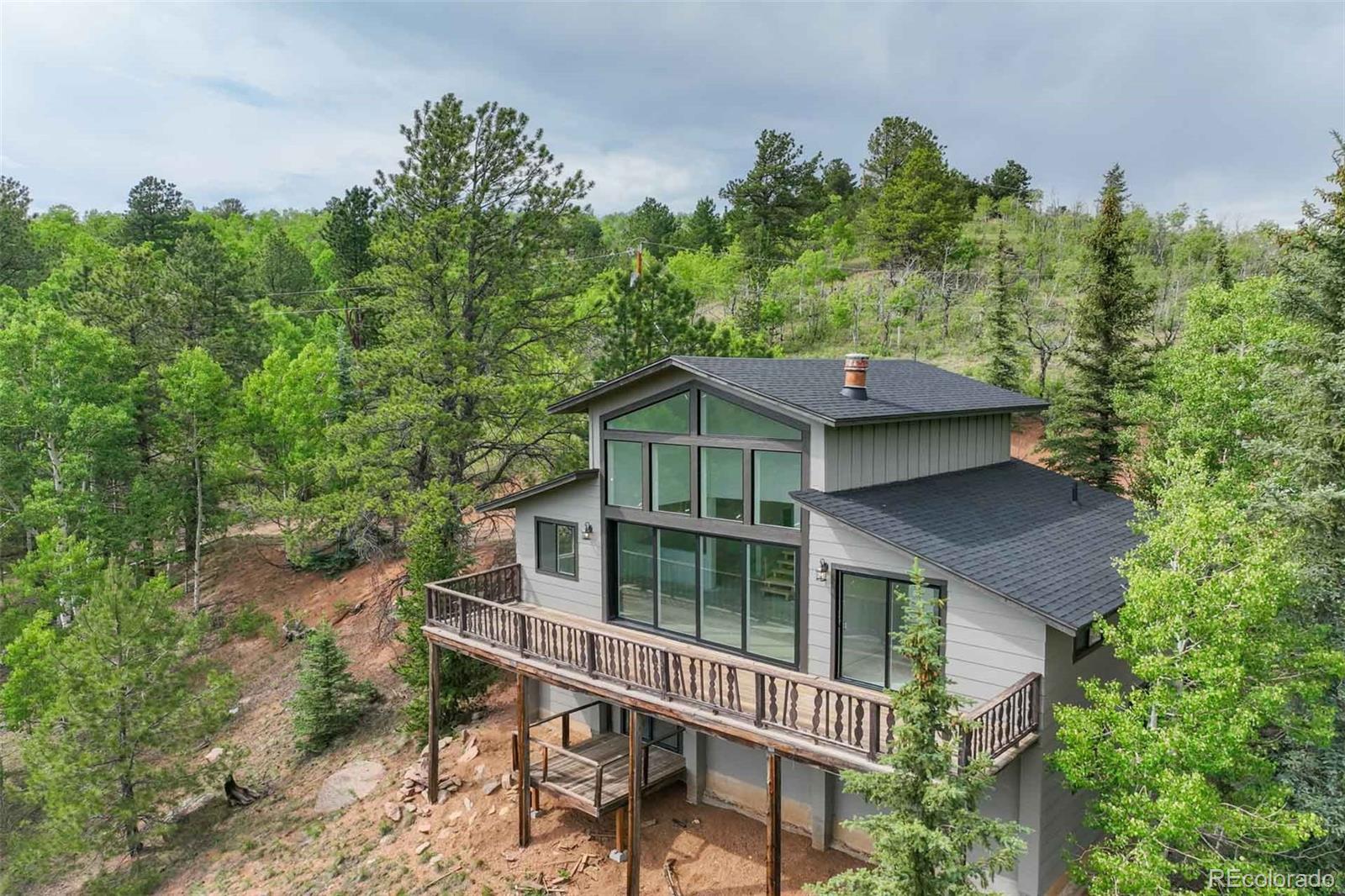 a house with trees in the background