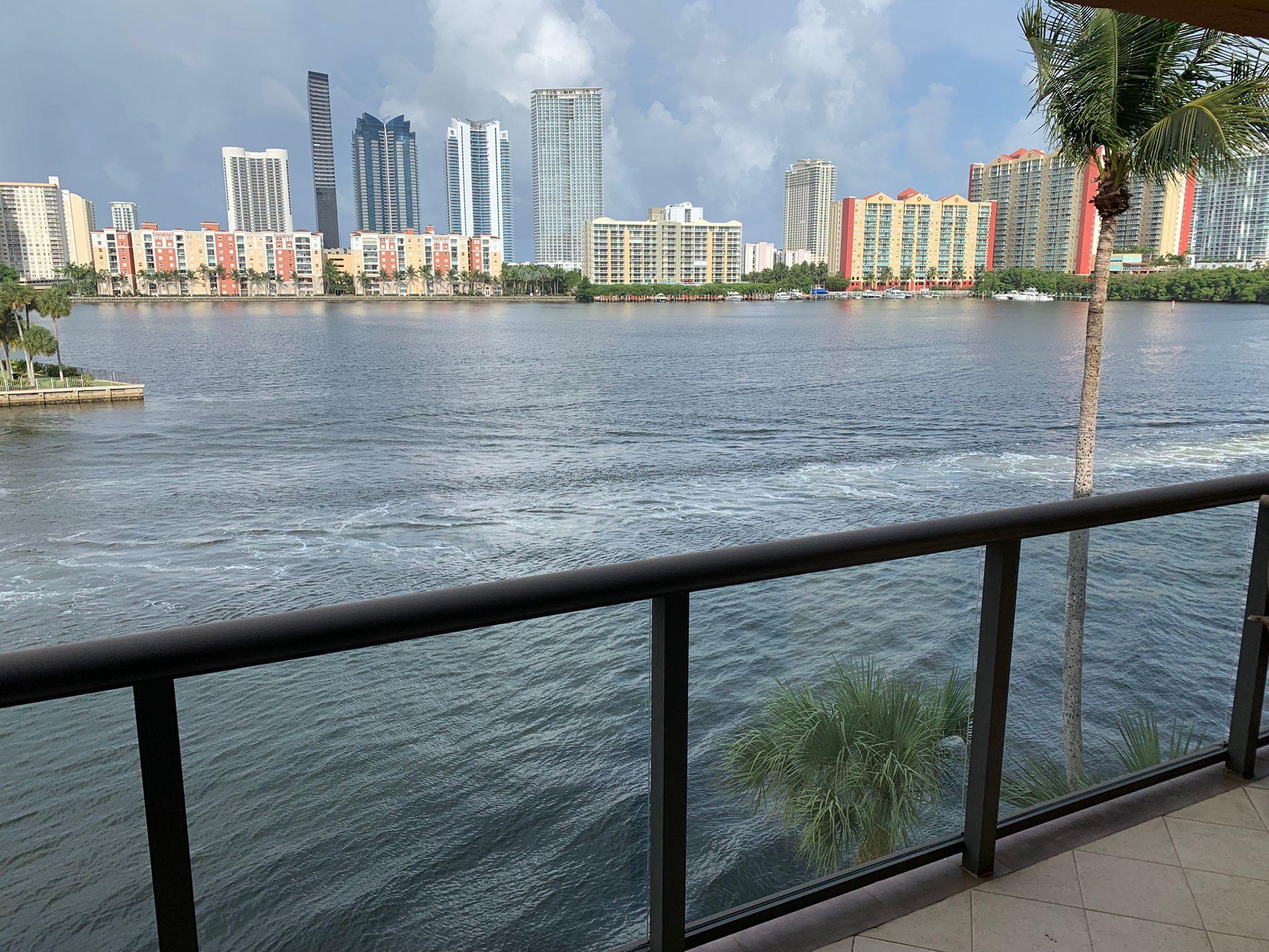 a view of swimming pool from a balcony