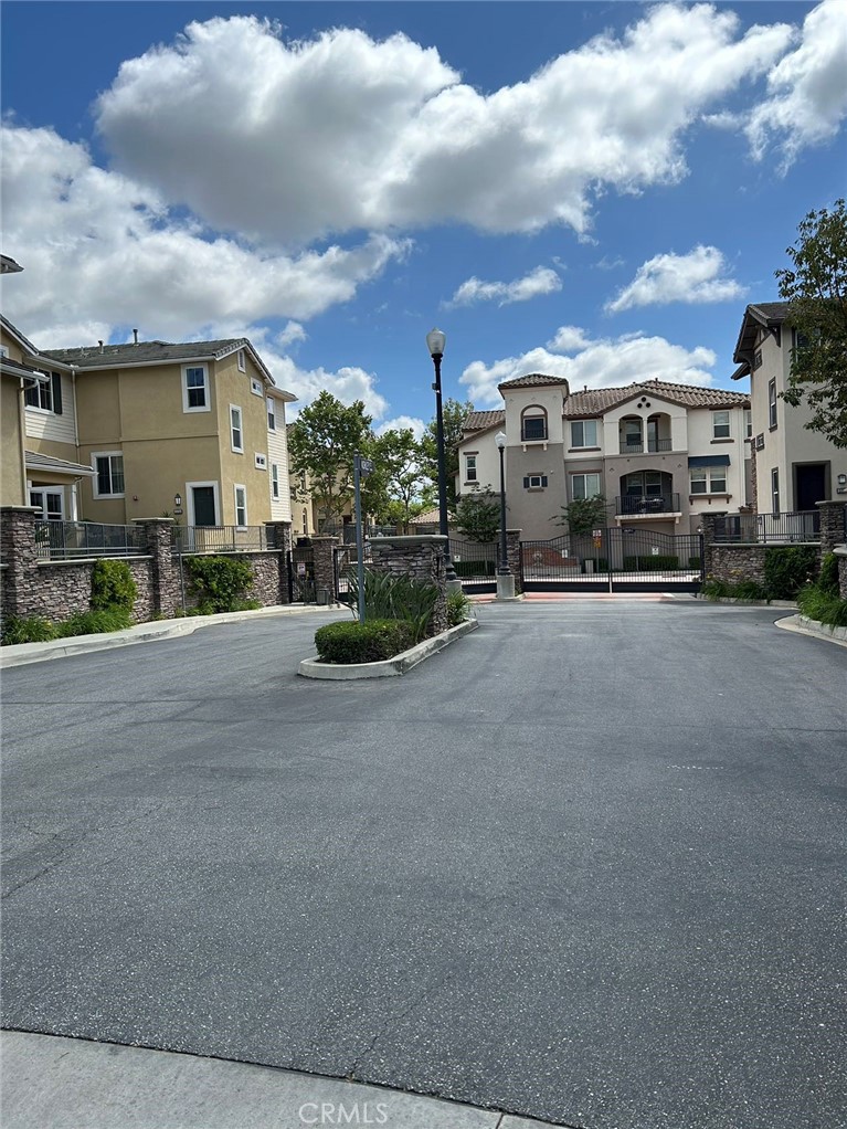 a view of a building with a street