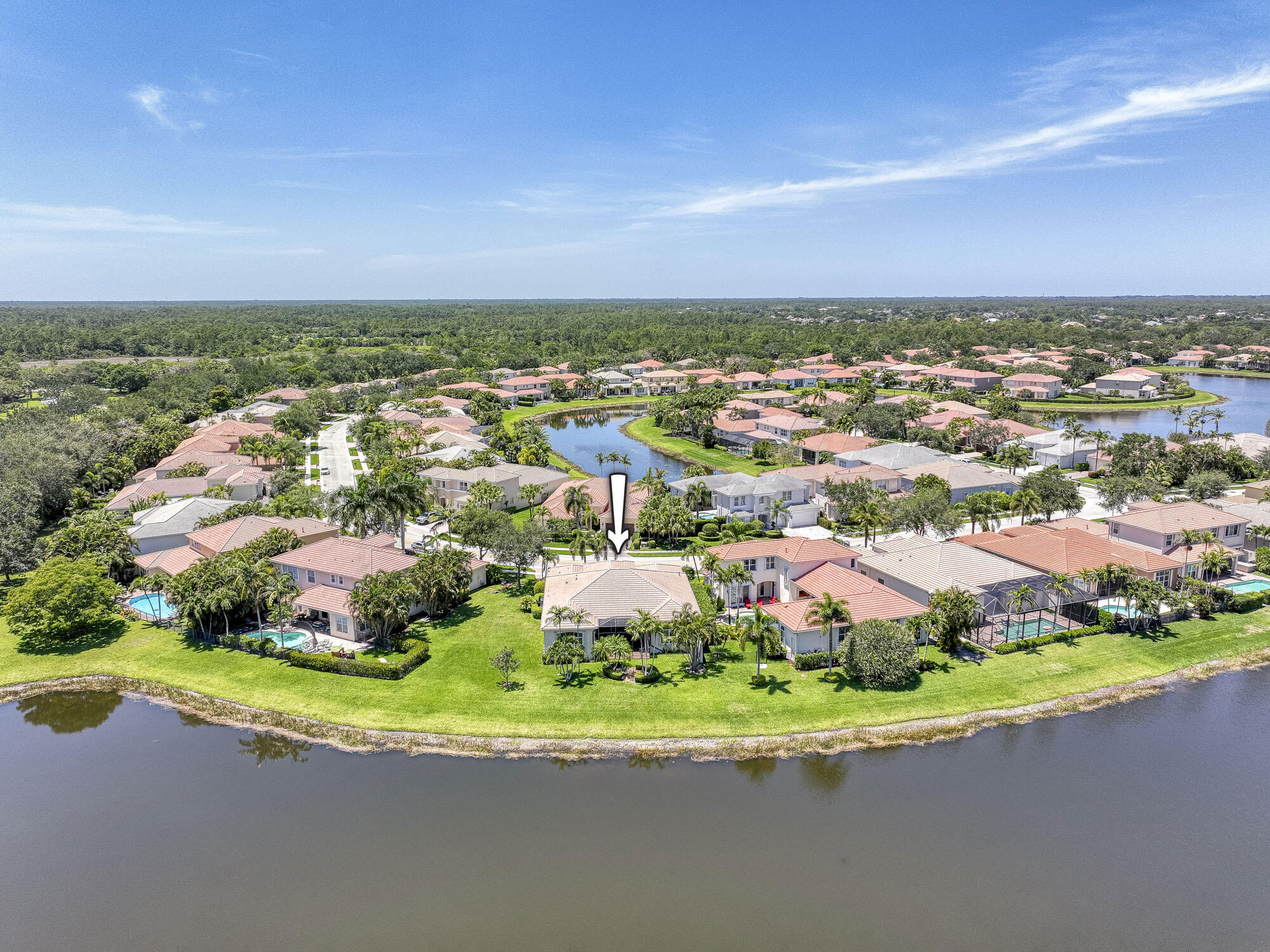 an aerial view of residential houses with outdoor space and street view