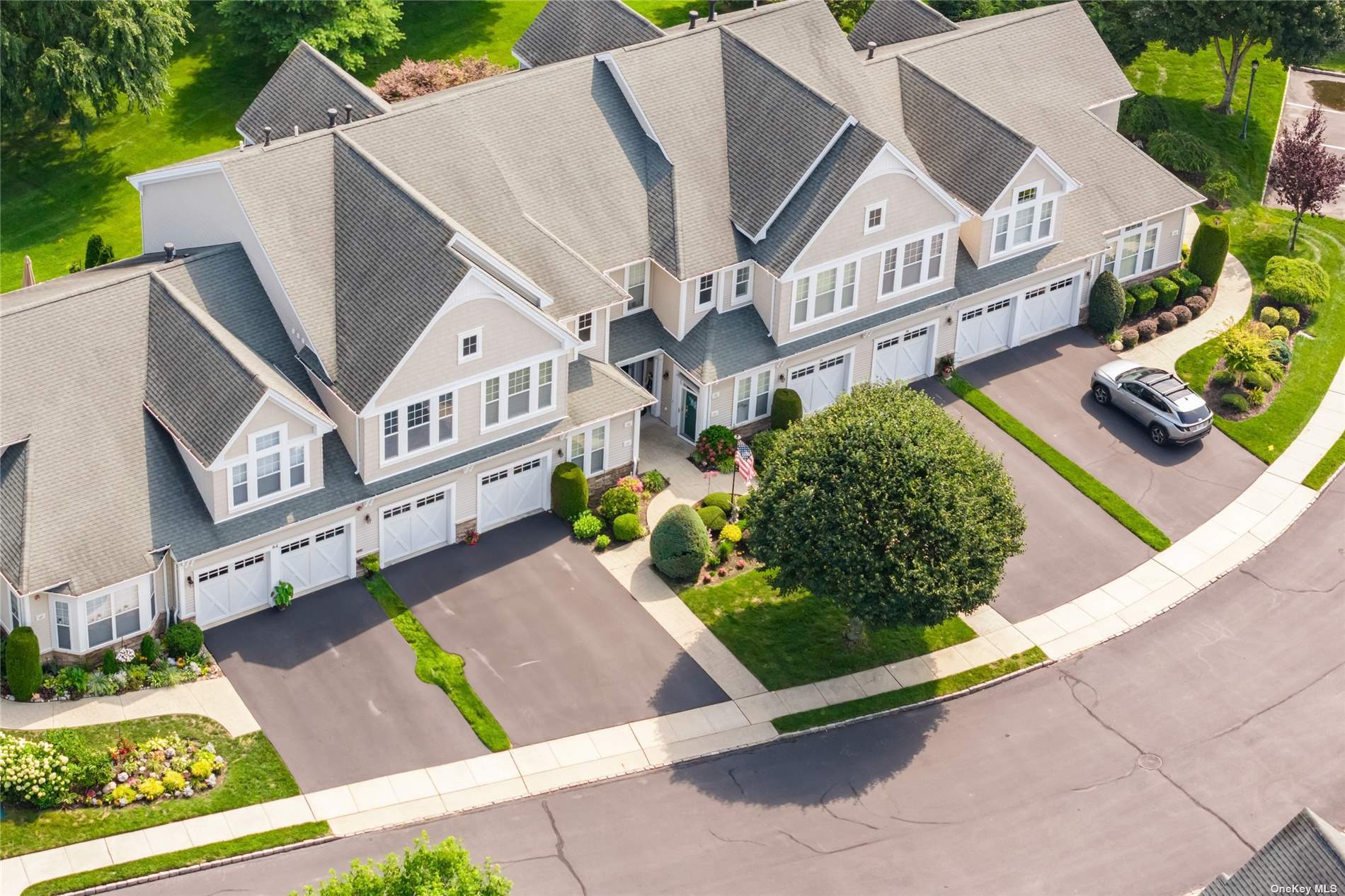 an aerial view of a house with a garden