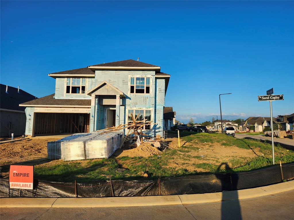 a view of a house with swimming pool