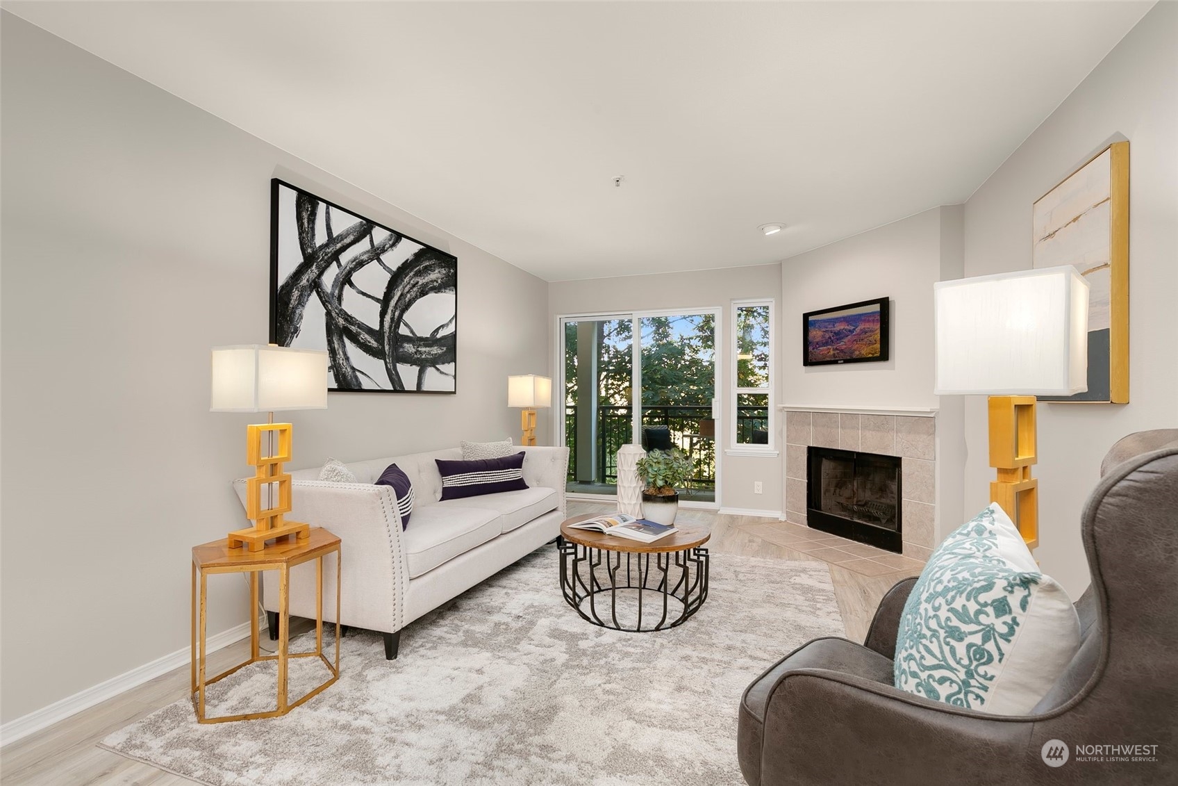 a living room with furniture and a fireplace