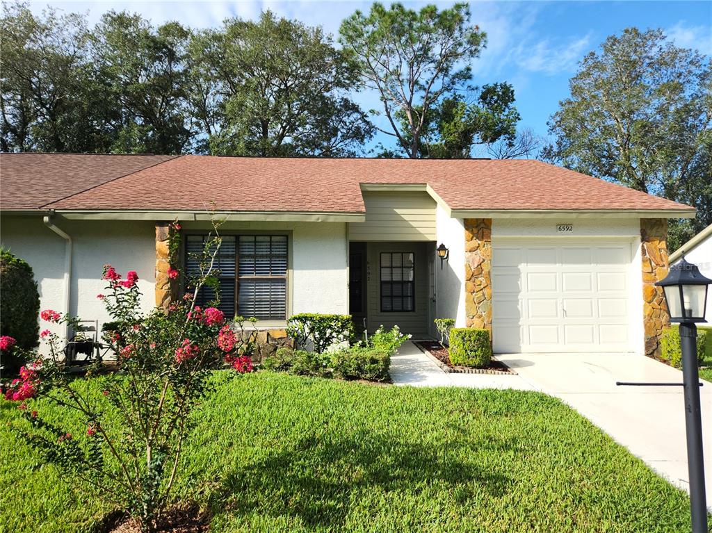 a front view of a house with a porch