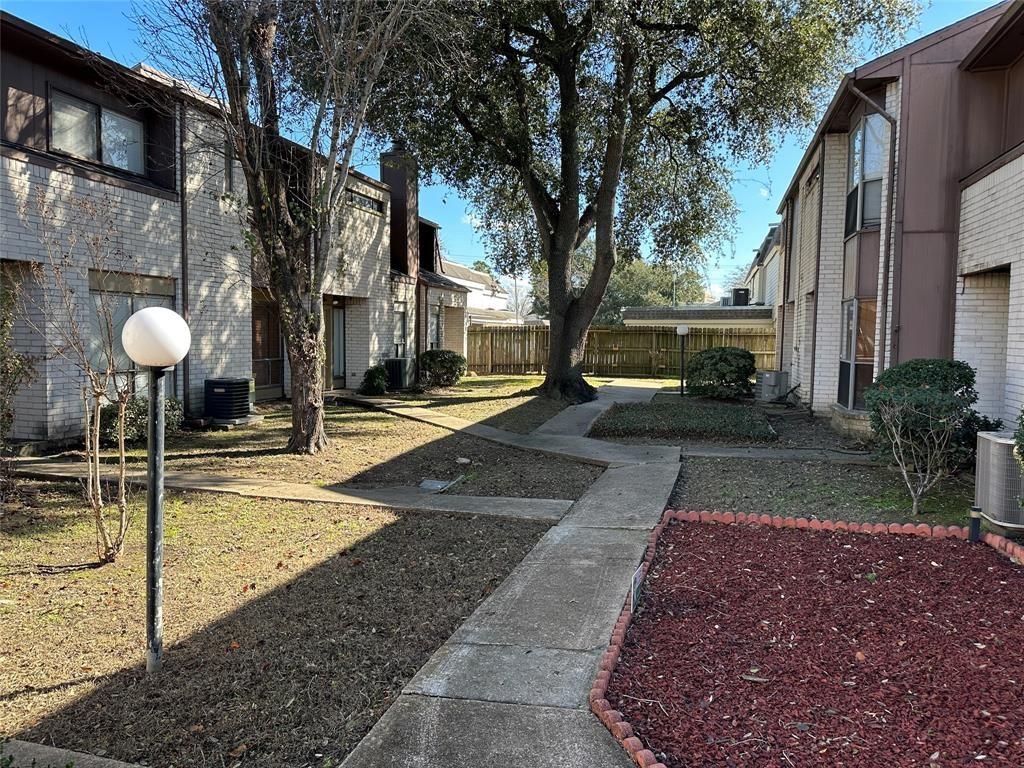 a view of a street with houses