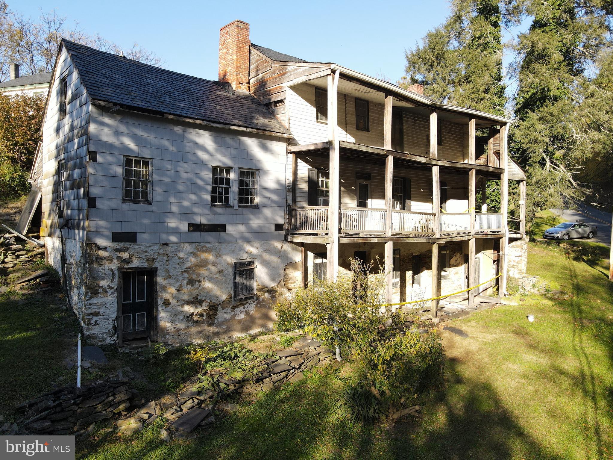 a view of a large building with a large tree