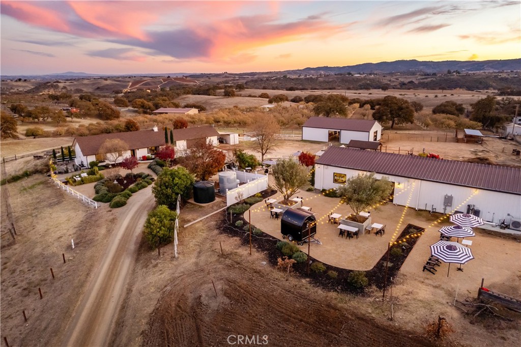 an aerial view of a house with a ocean view