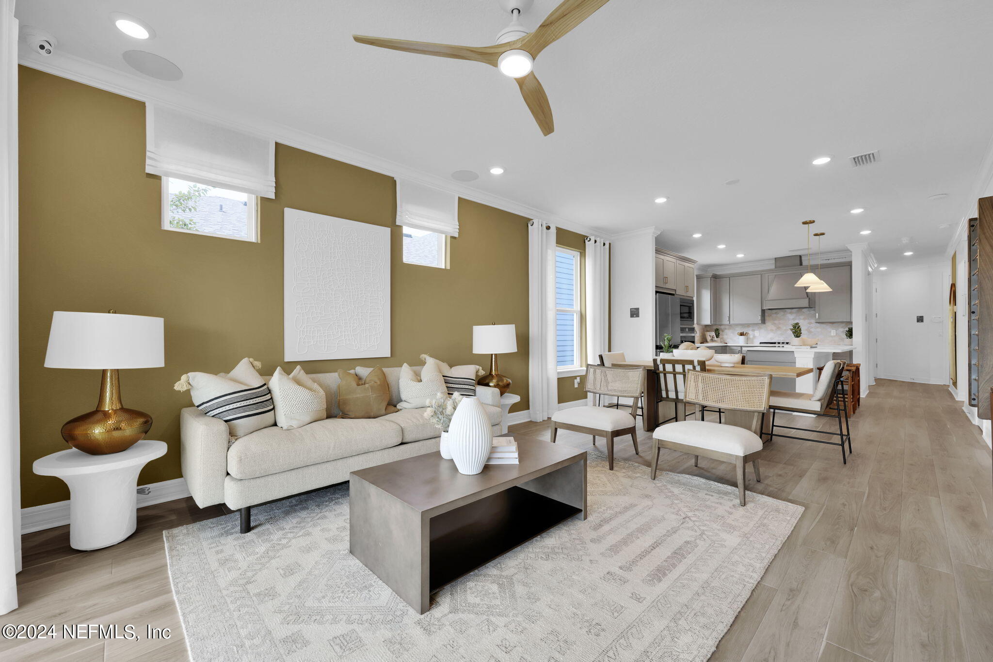 a living room with furniture and a table