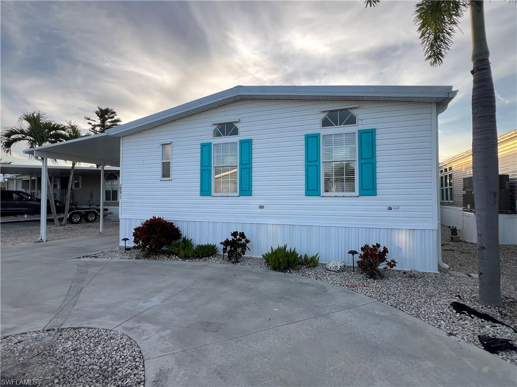 Front View with Horseshoe Driveway