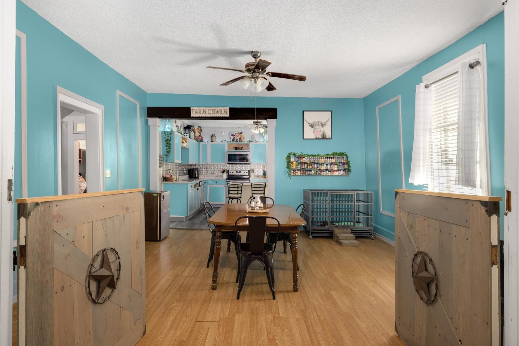 a view of a livingroom with furniture window and wooden floor