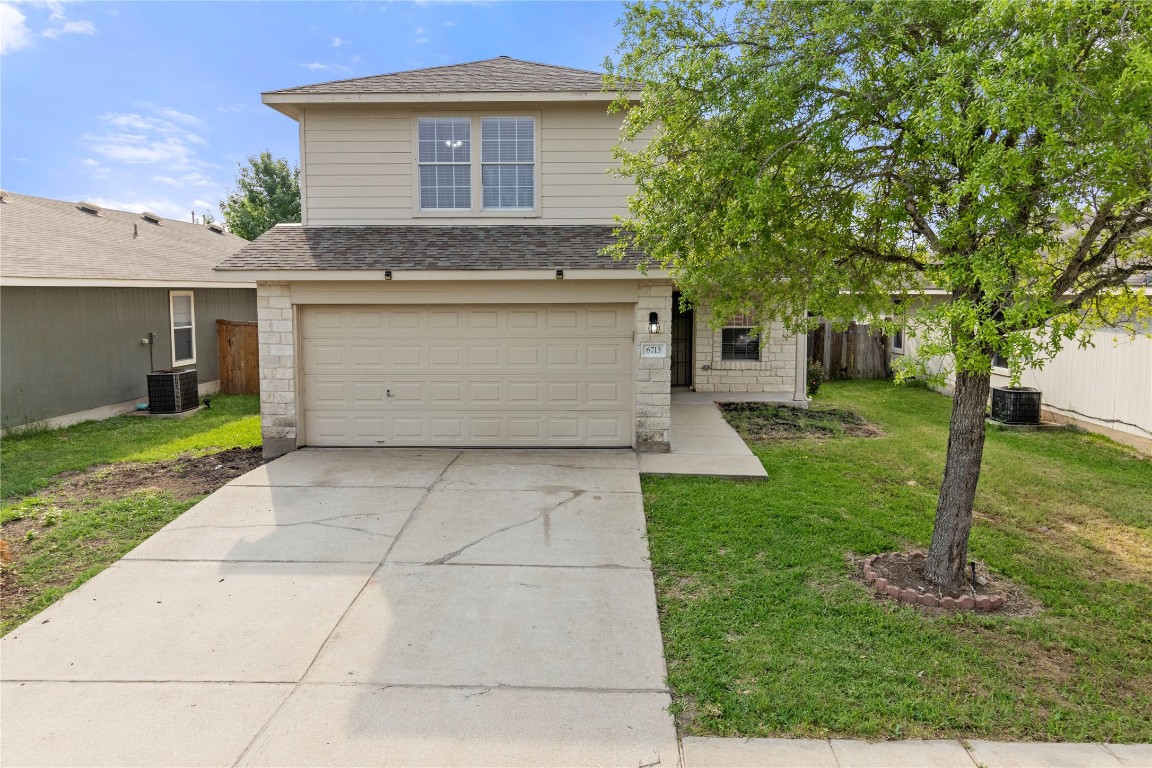 front view of house with a yard