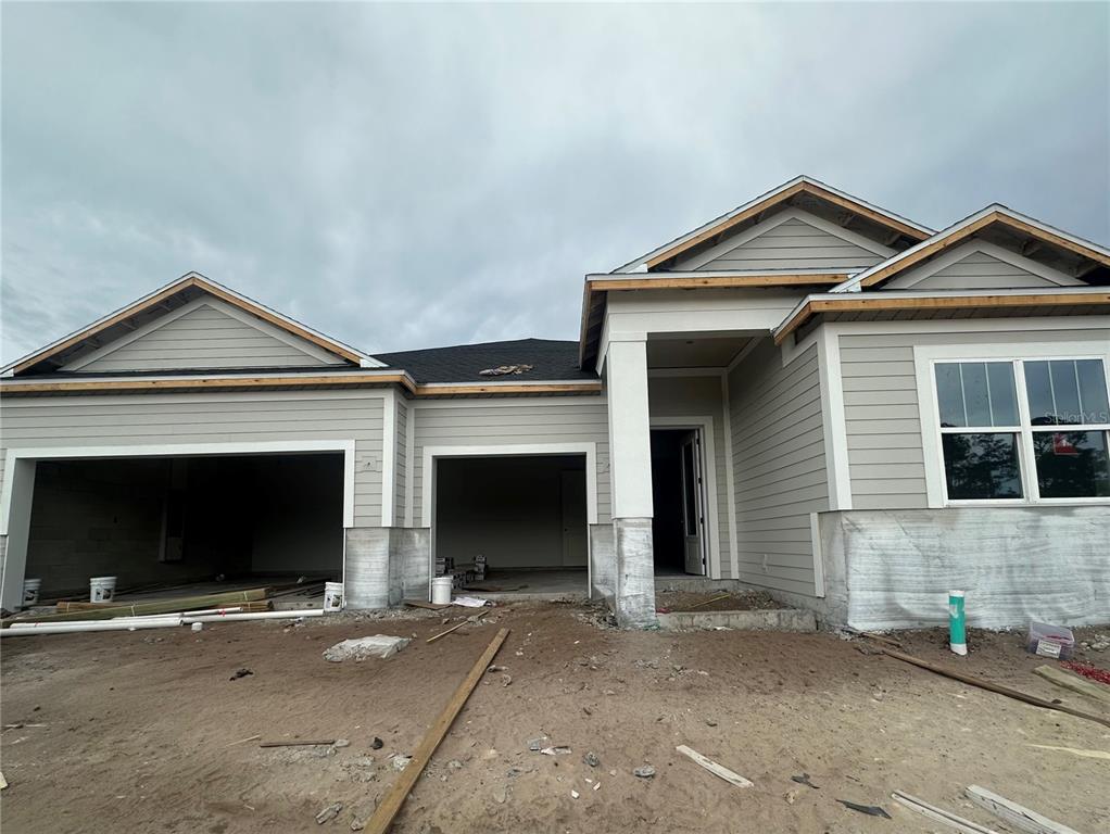 a front view of a house with yard