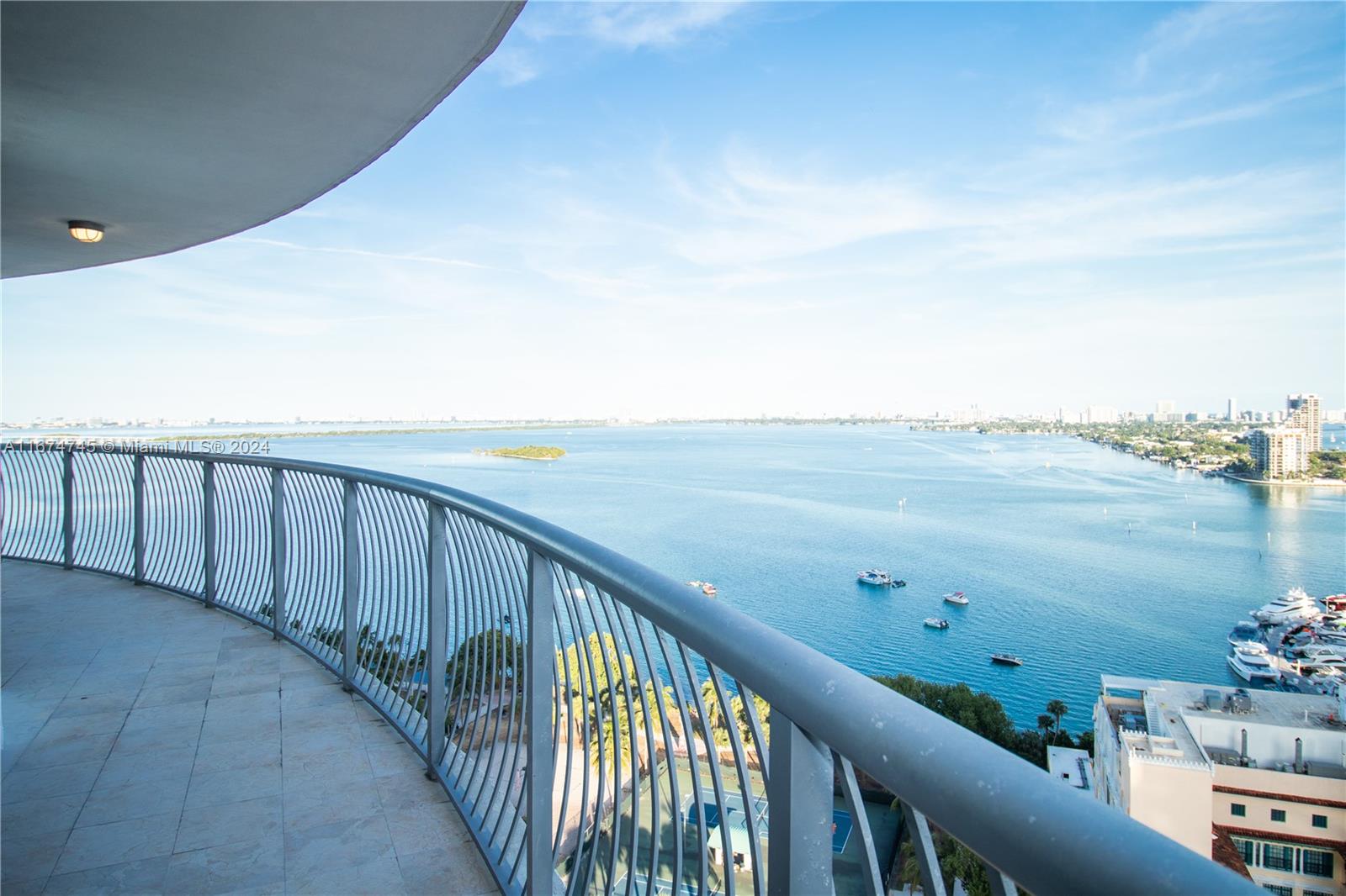 a balcony with an ocean view