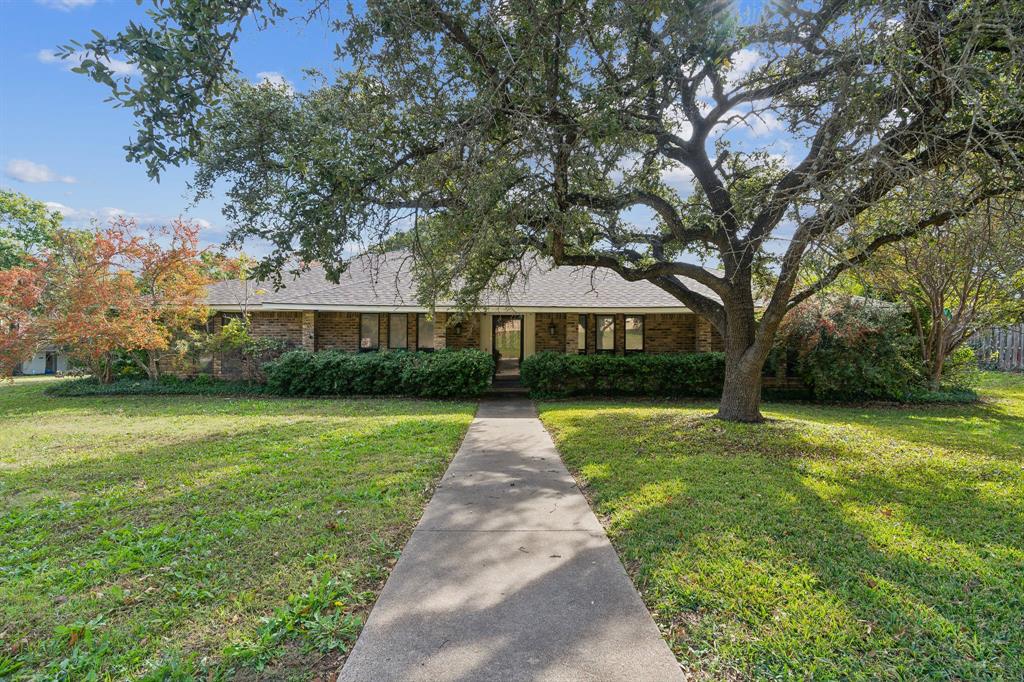 a front view of house with yard