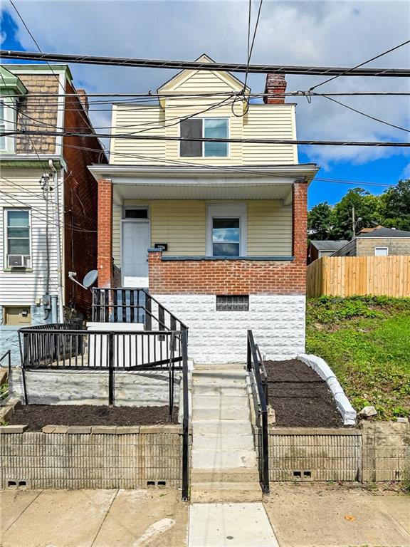 a view of a house with a balcony