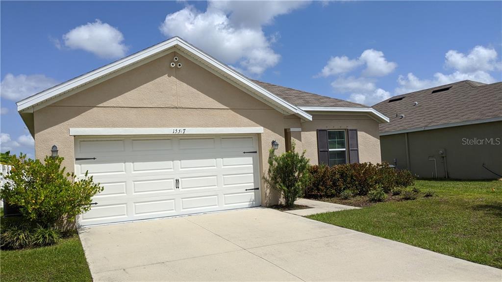 a front view of house with yard