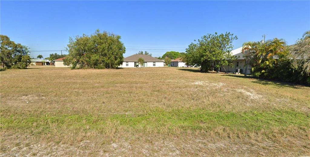 a view of outdoor space and yard