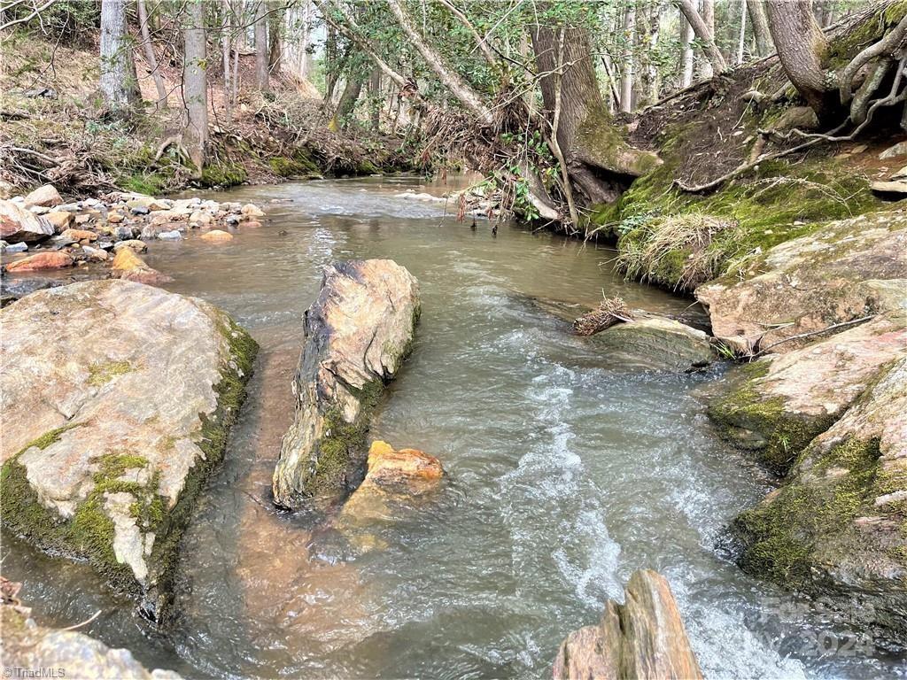 a view of a wooden fence with two of water