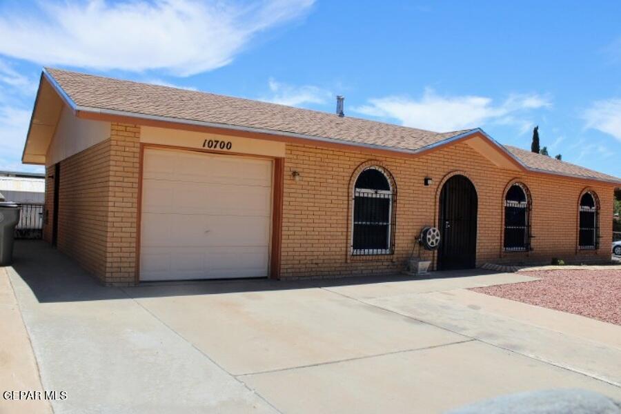 a view of a house with a garage