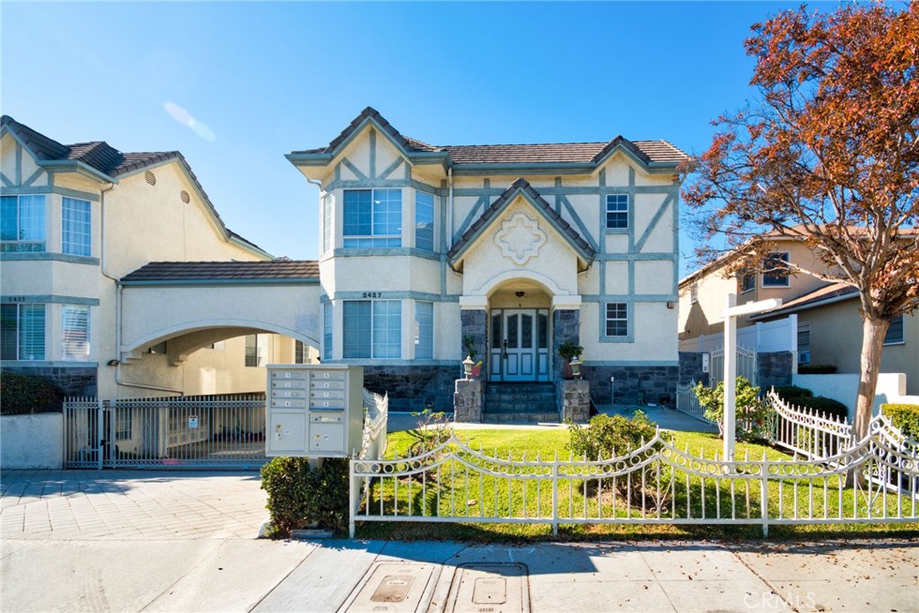 a view of front a house with a fountain