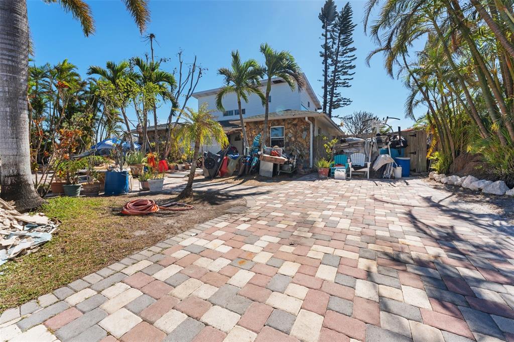 a view of a patio with a tree