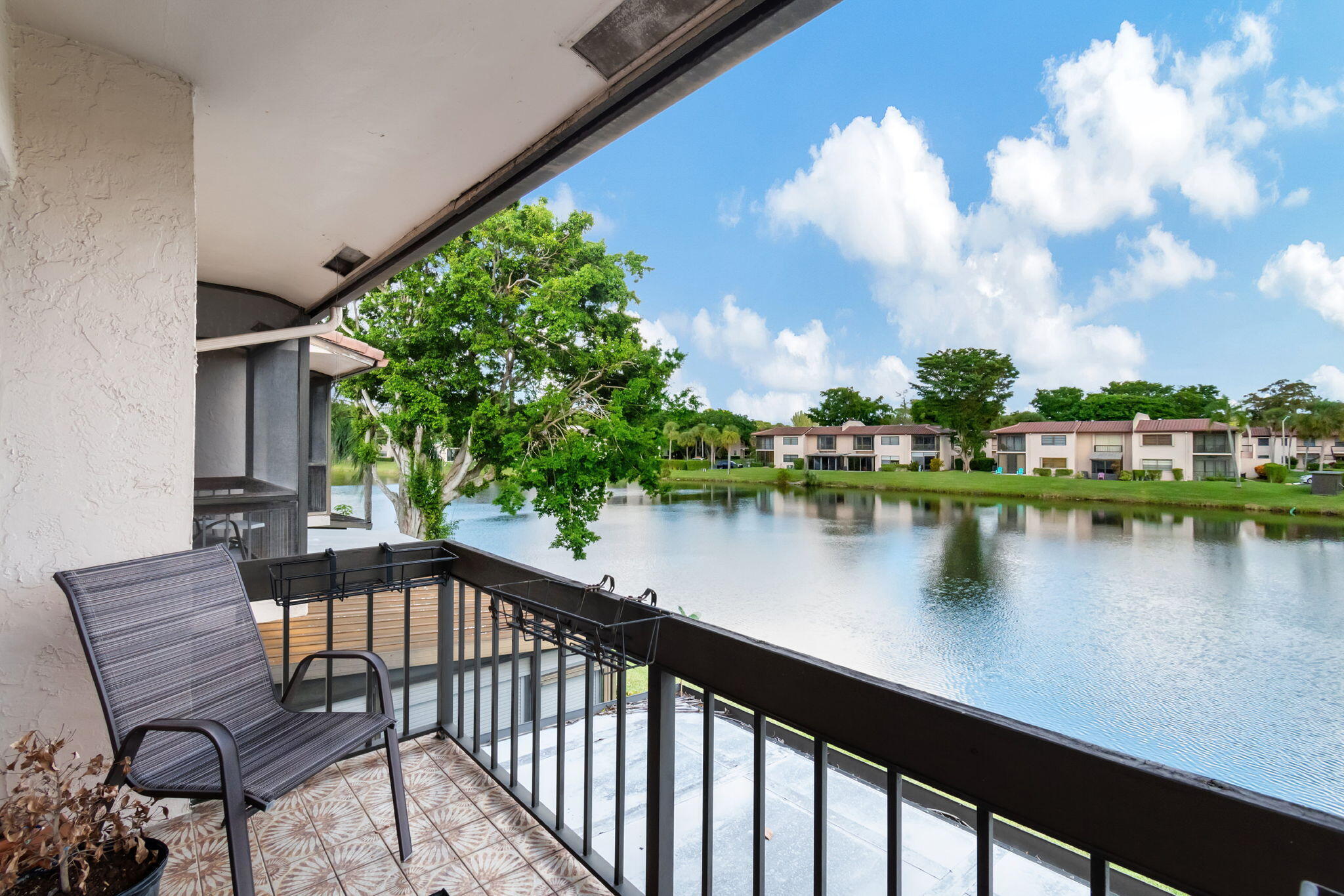 a view of a lake from a balcony