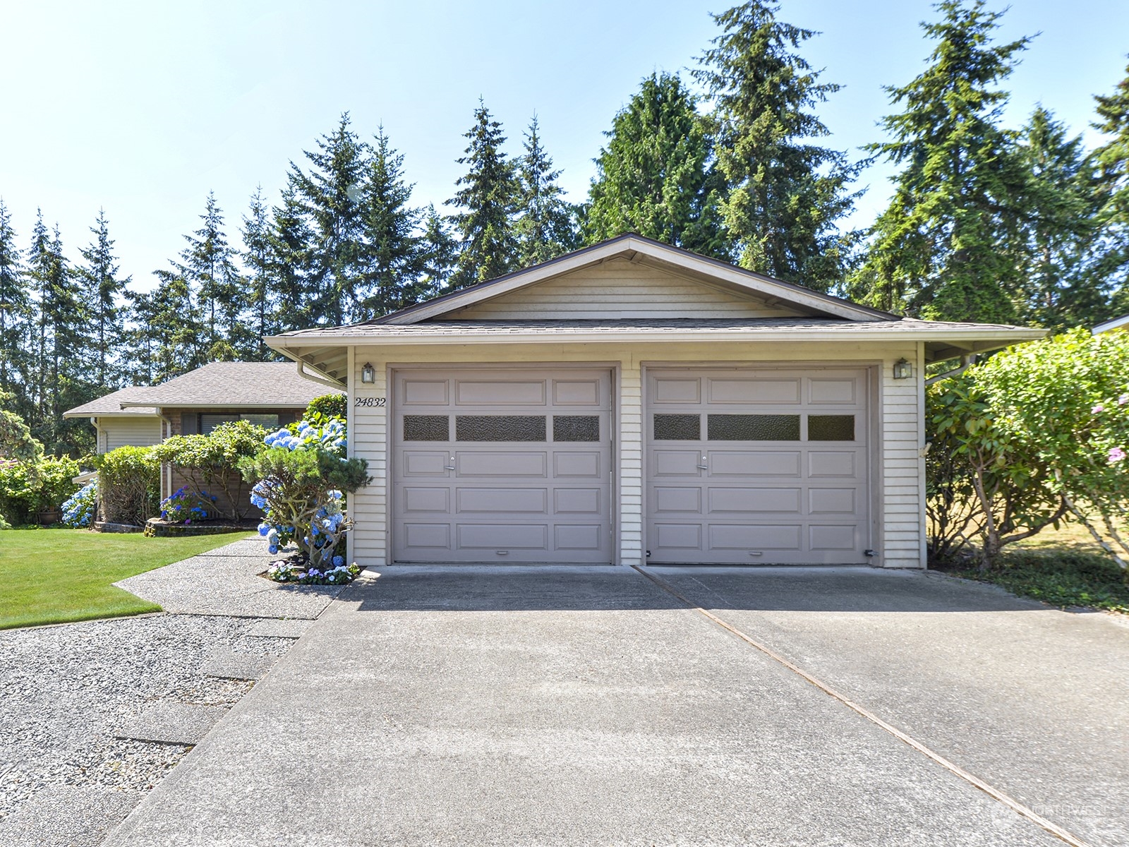 front view of a house with a yard