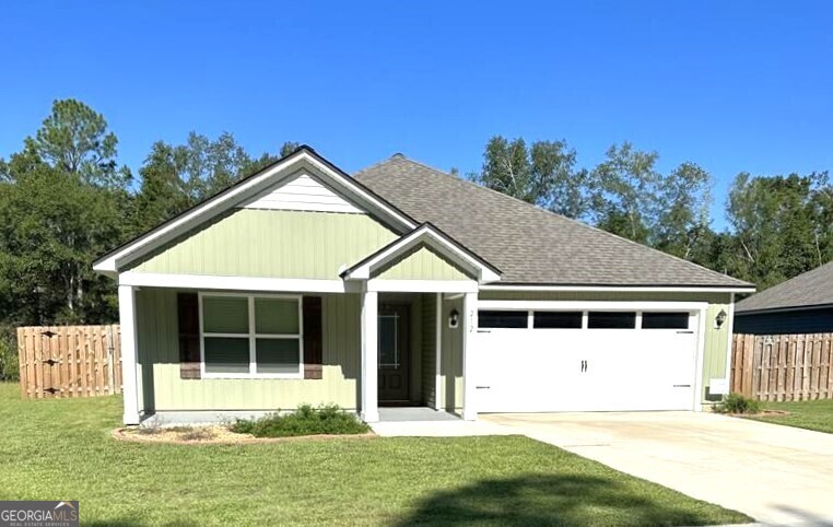 a house with trees in the background