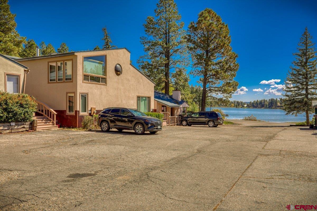 a view of car parked in front of house