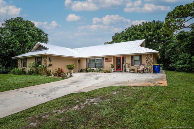 $650,000 | 597 Southwest Wood Creek Drive | Palm City