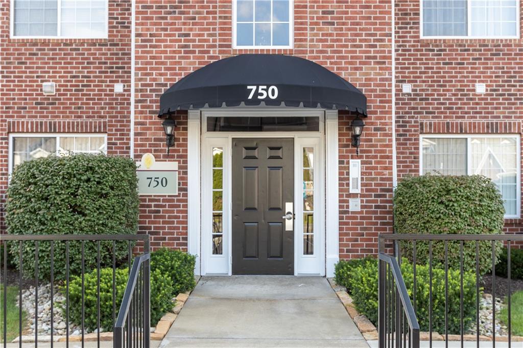 a front view of a house with a door