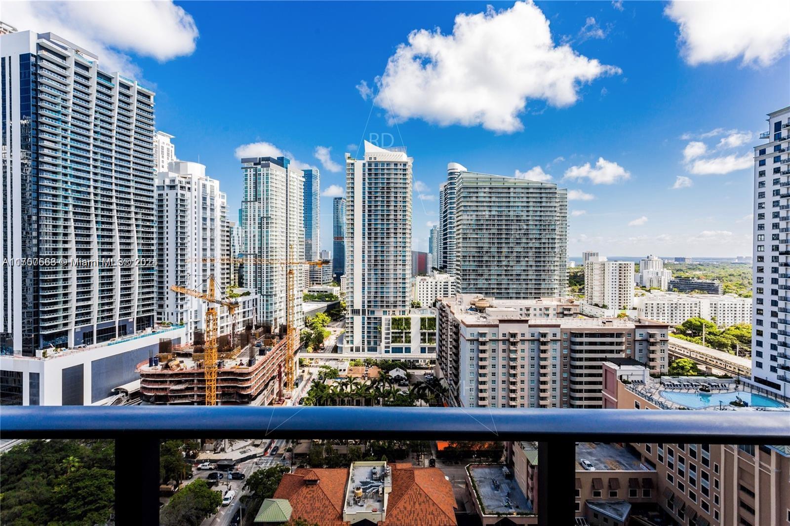 a view of a balcony with city view