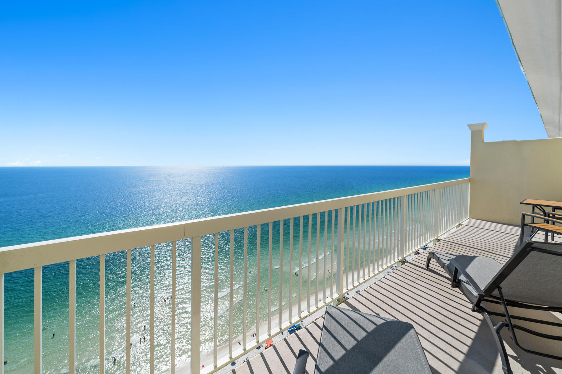 a view of balcony with wooden floor