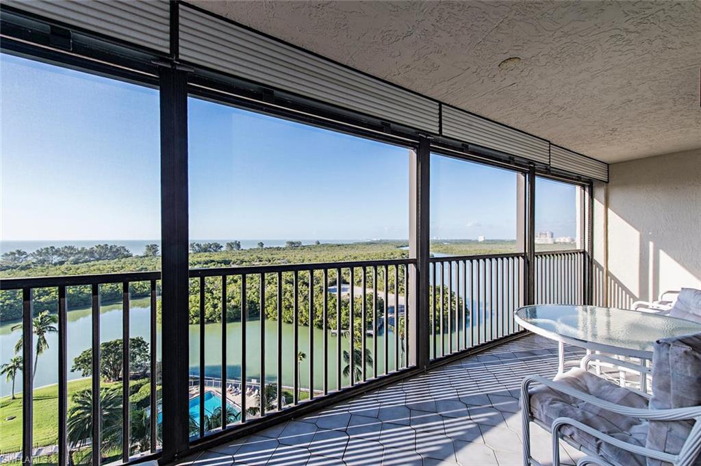 a view of a balcony with furniture