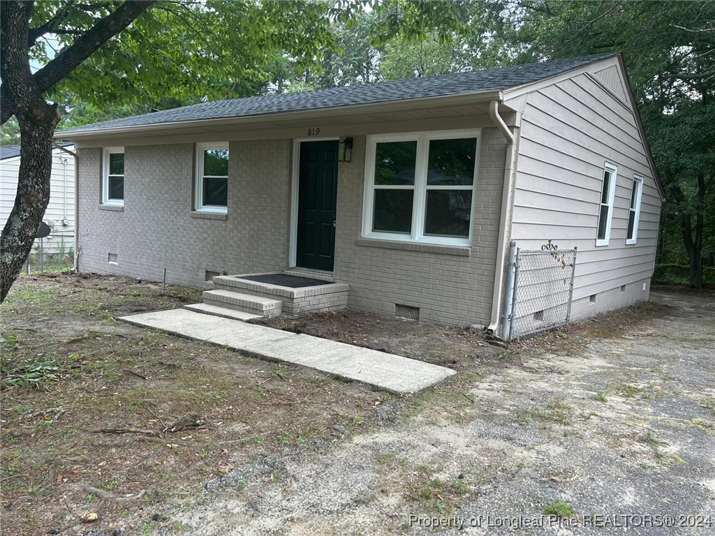 a view of backyard of house