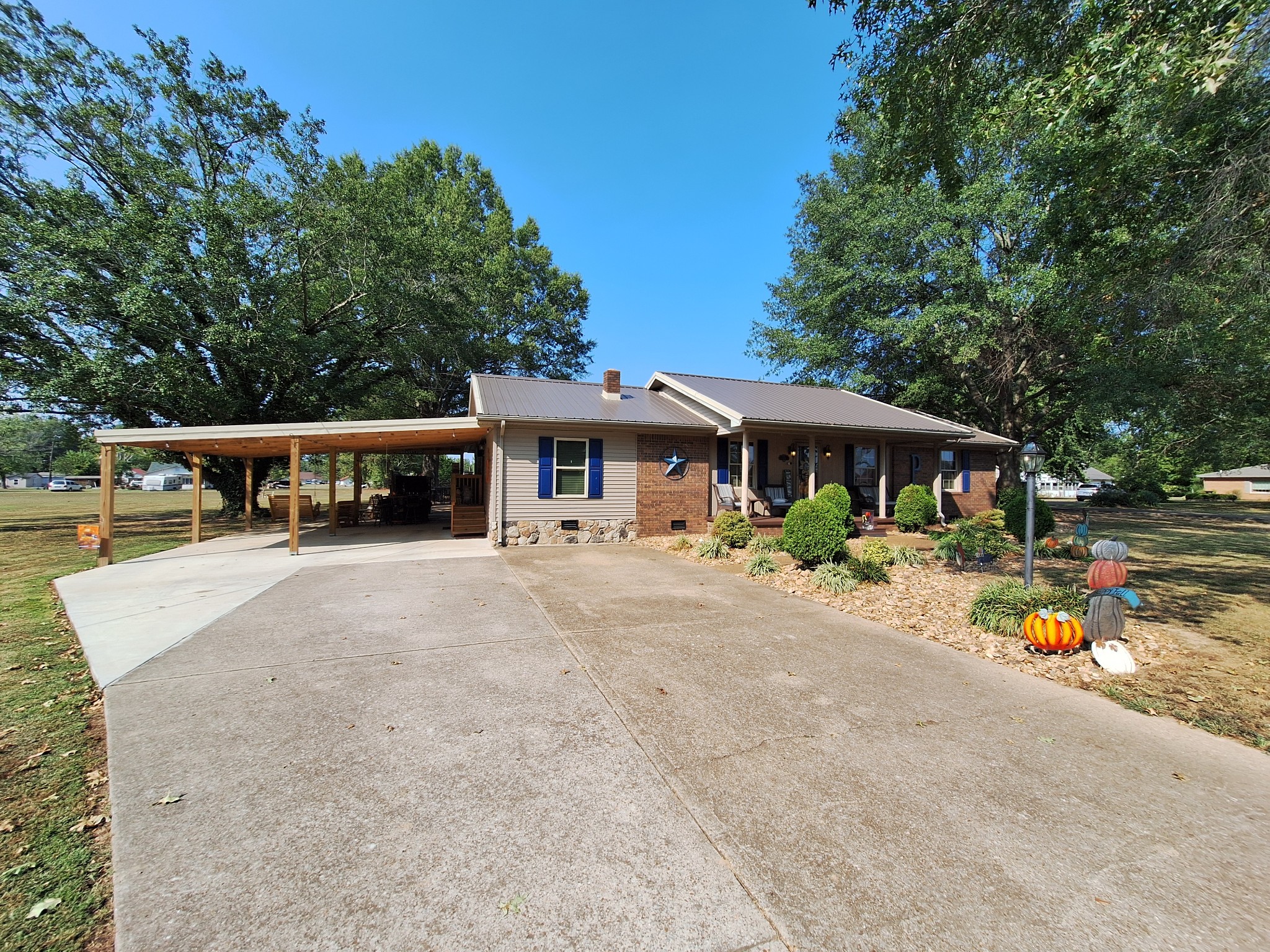 front view of a house with a patio