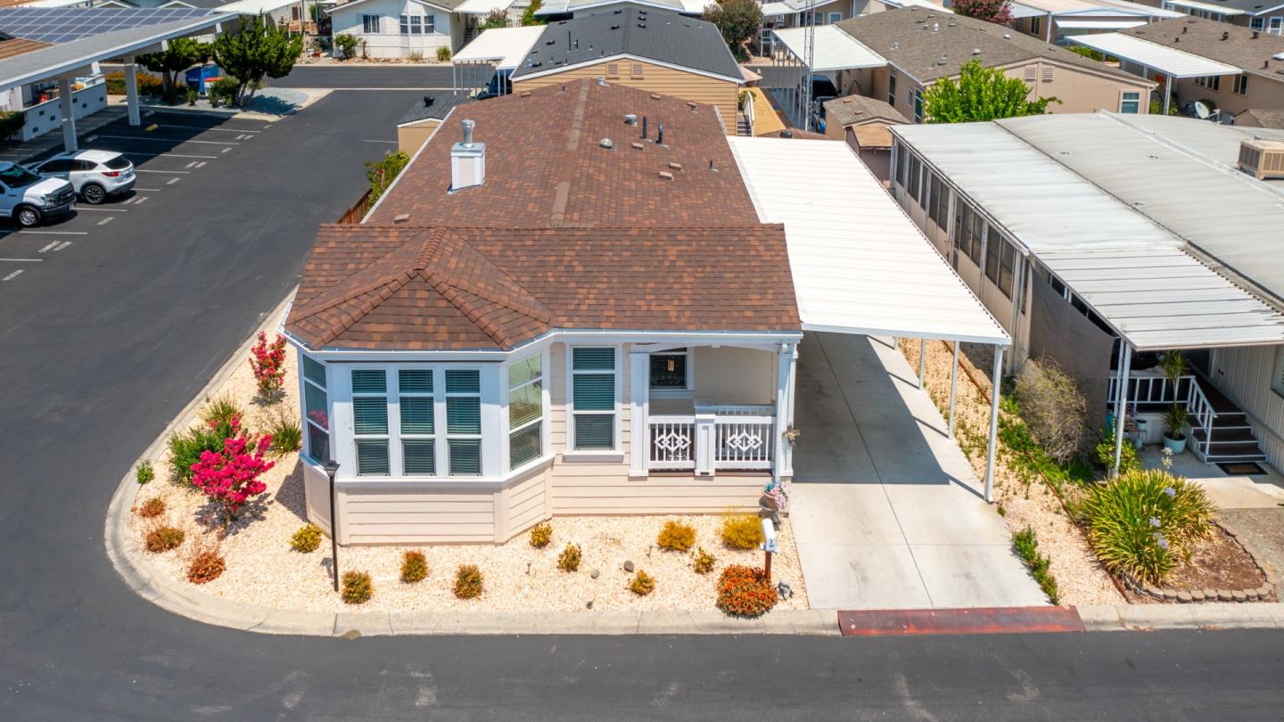 an aerial view of a house with swimming pool