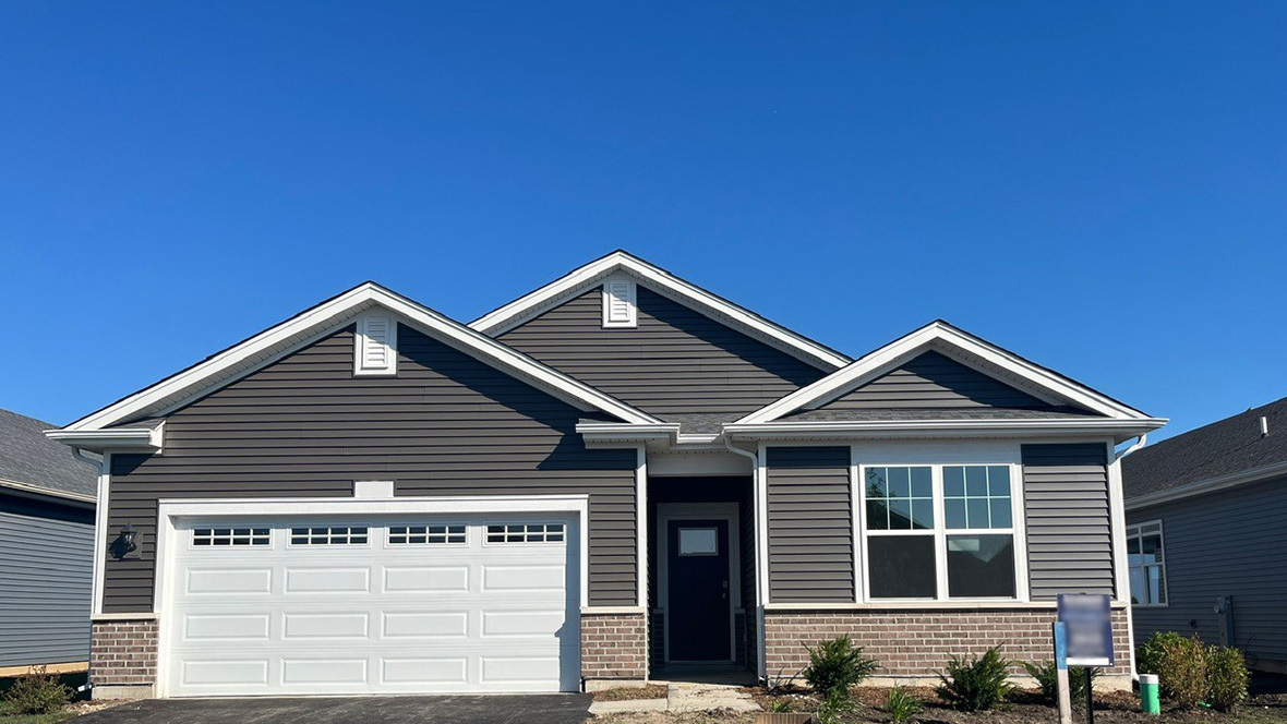 a view of a house with garage