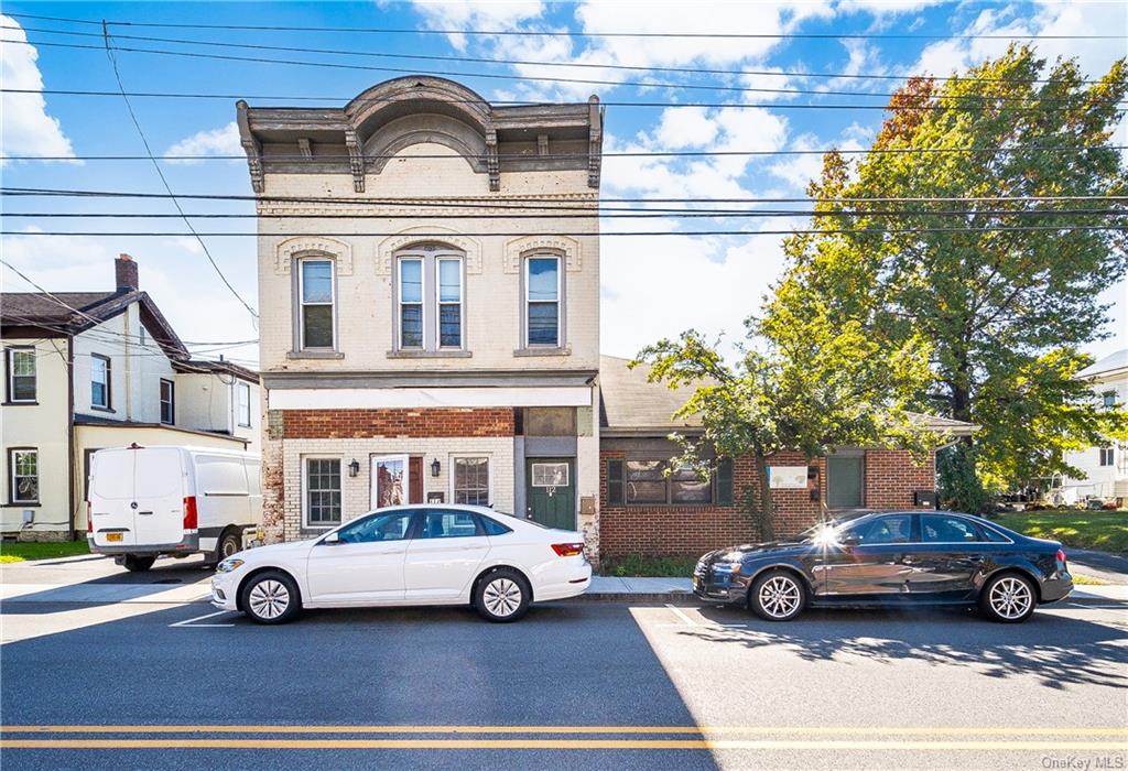 a car parked in front of a building