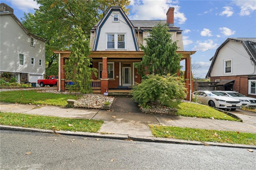 a front view of house with yard