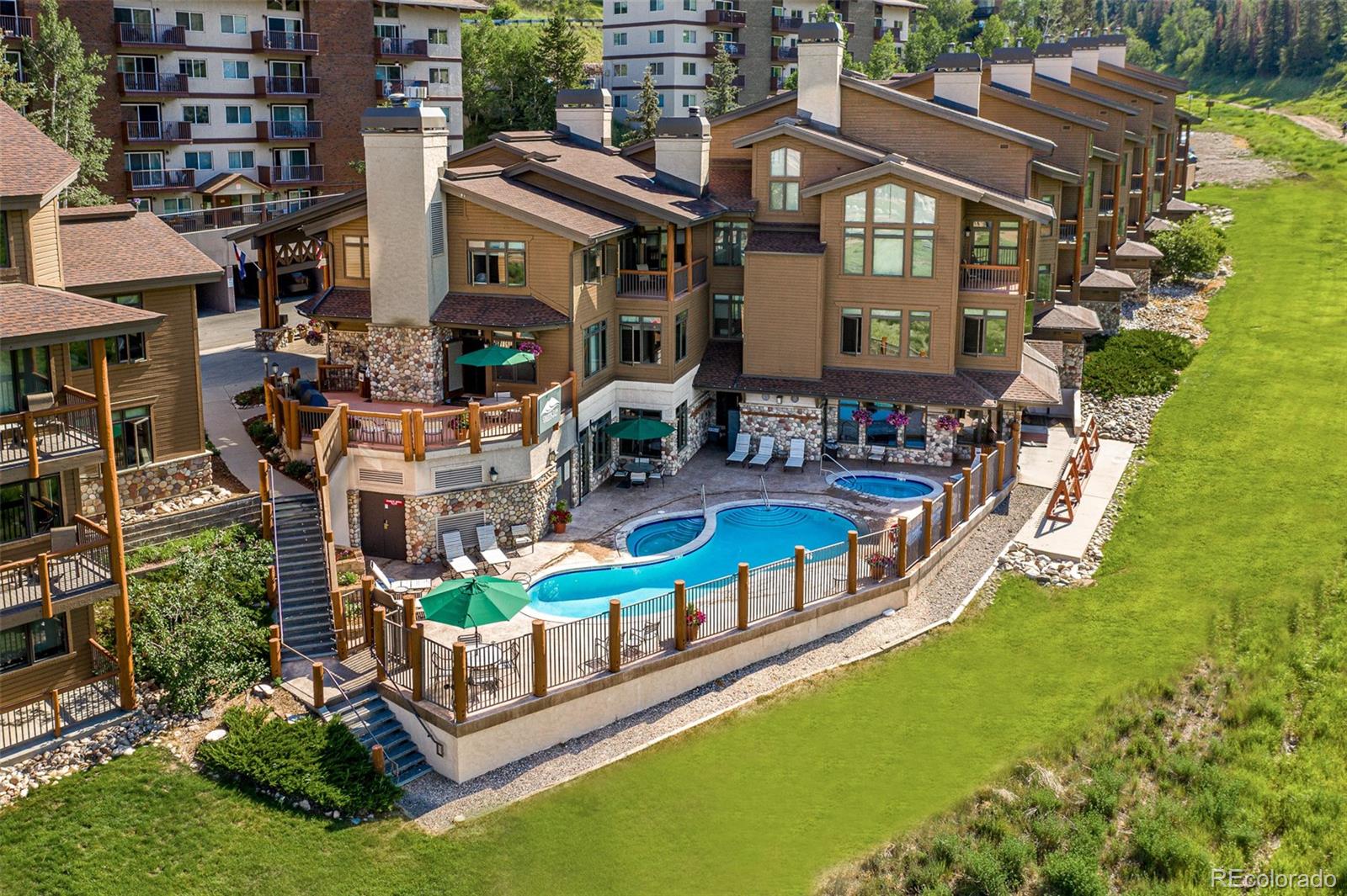 aerial view of a house with swimming pool