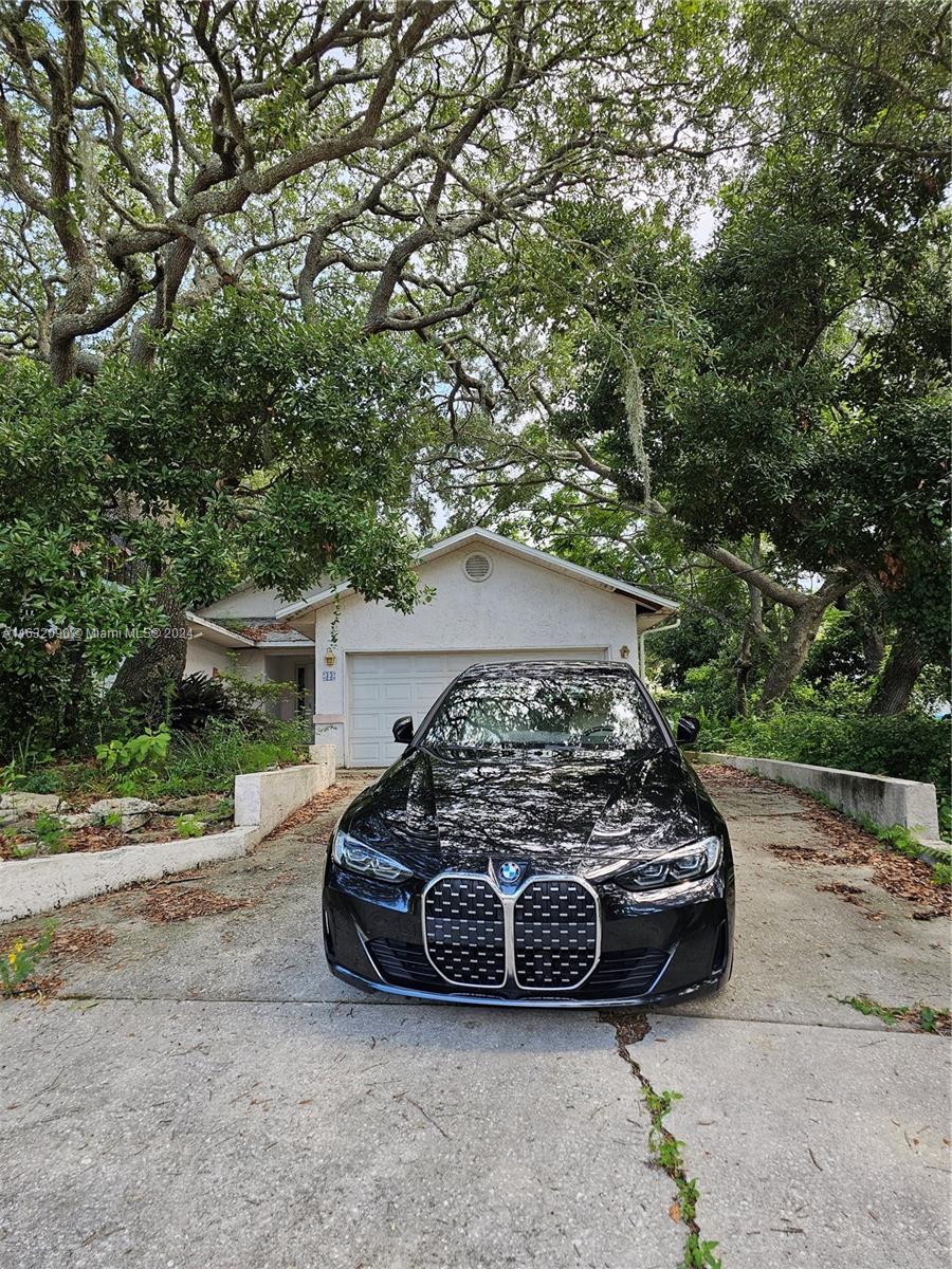 a car parked in front of a house