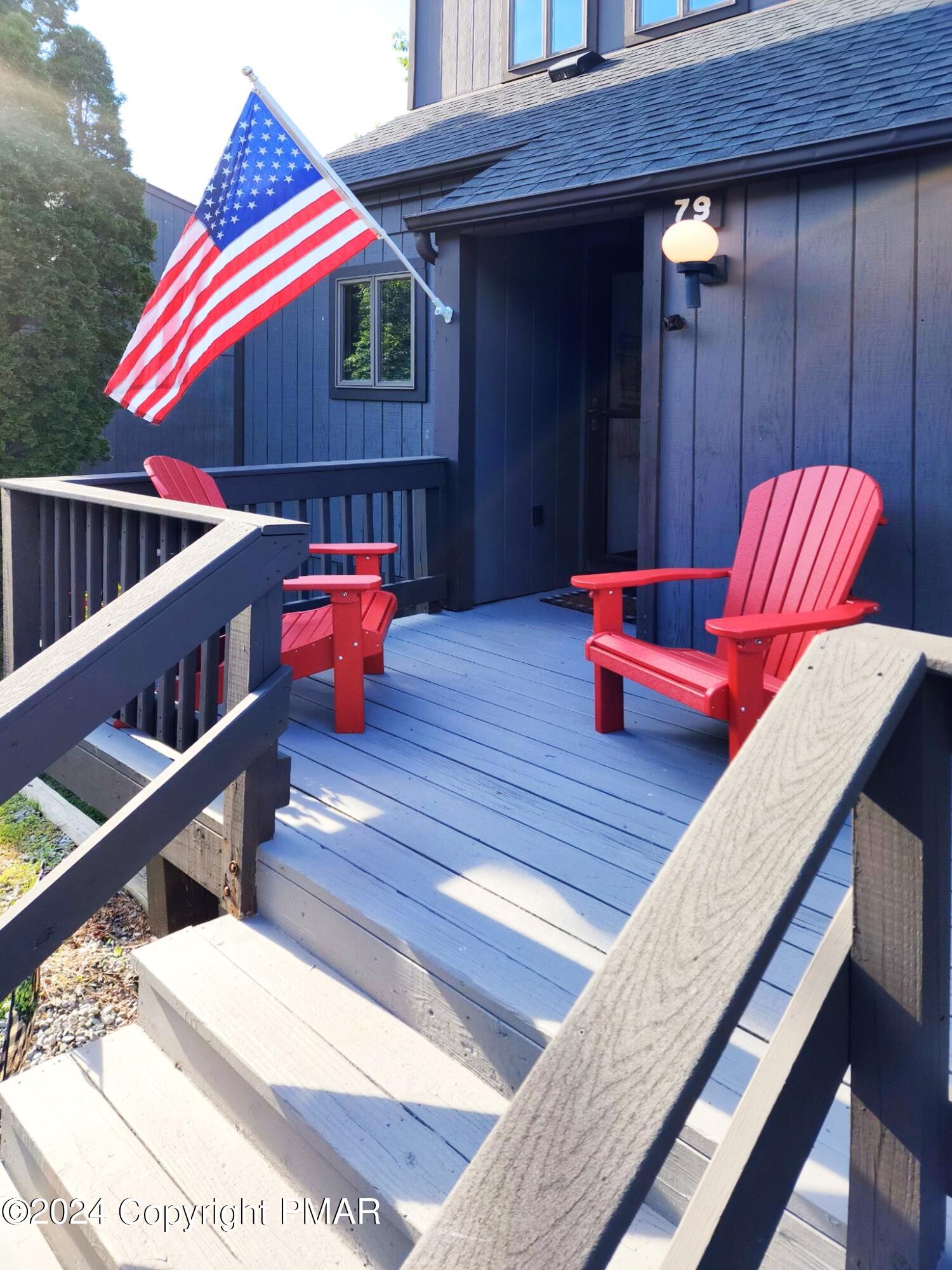 a backyard of a house with seating space