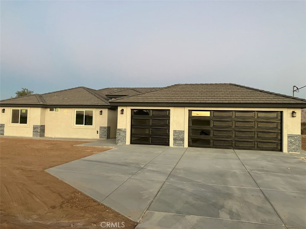 a view of a house with a garage