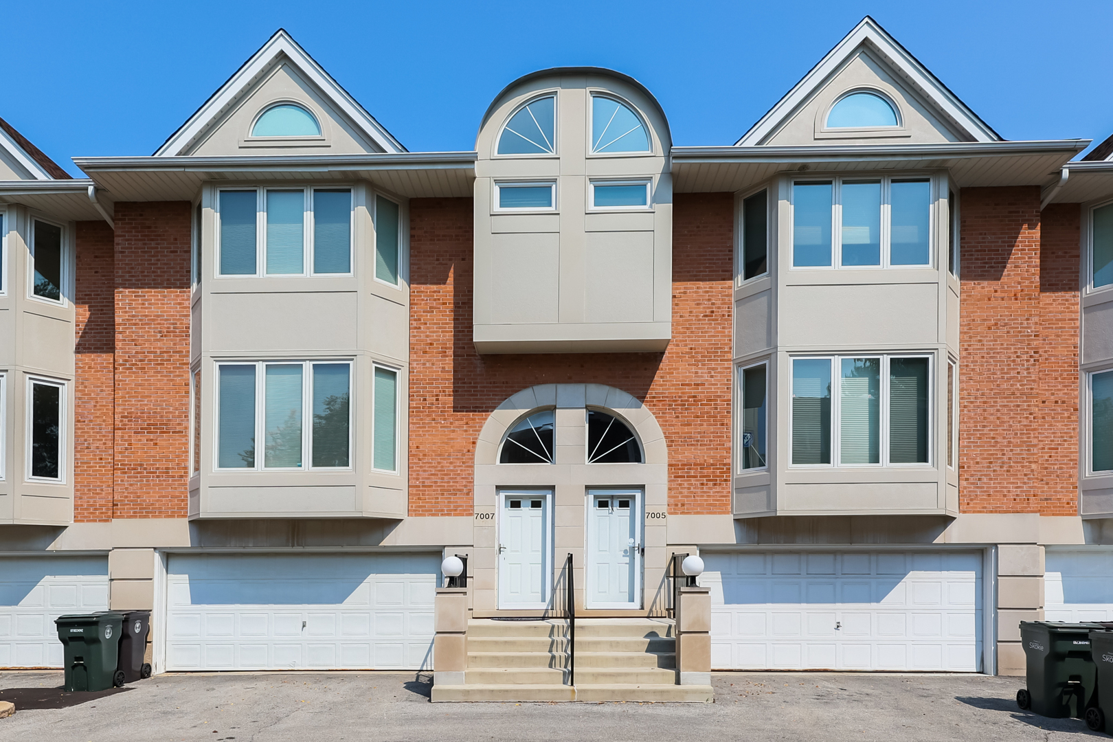 a front view of a house with a front door