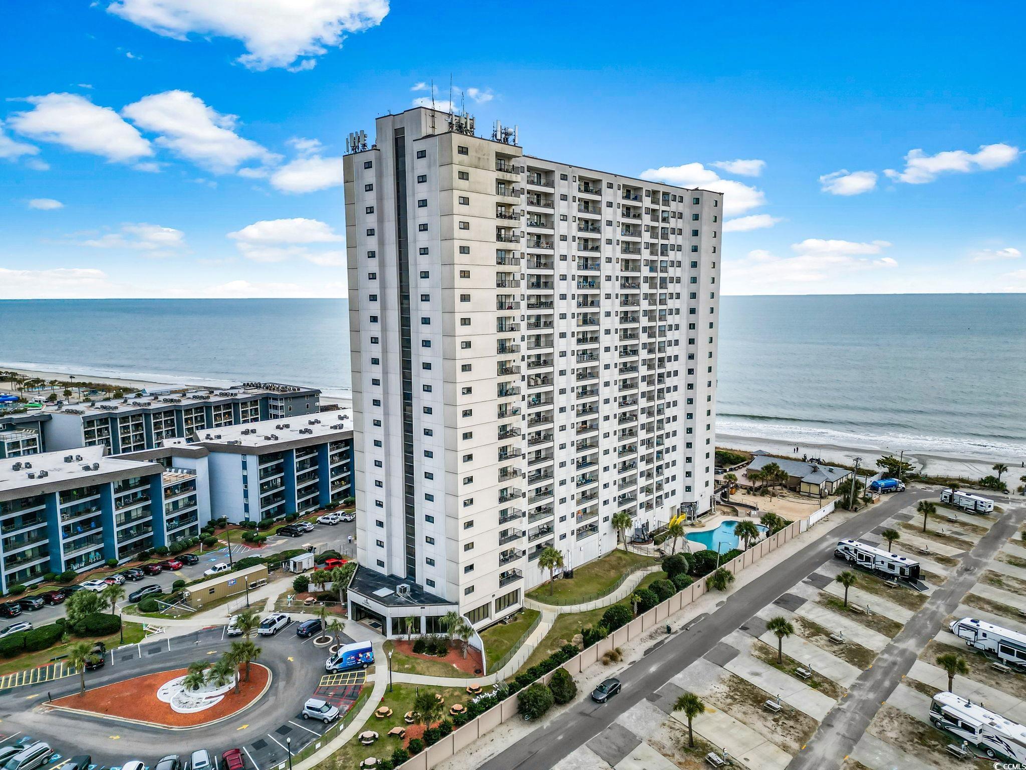 View of building exterior featuring a water view a