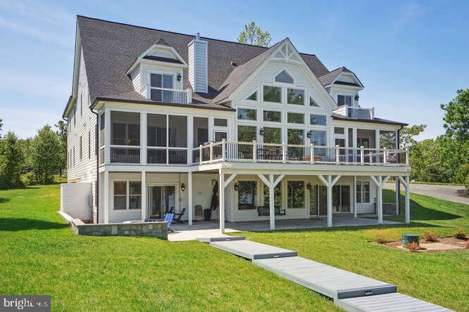 front view of a house with a swimming pool