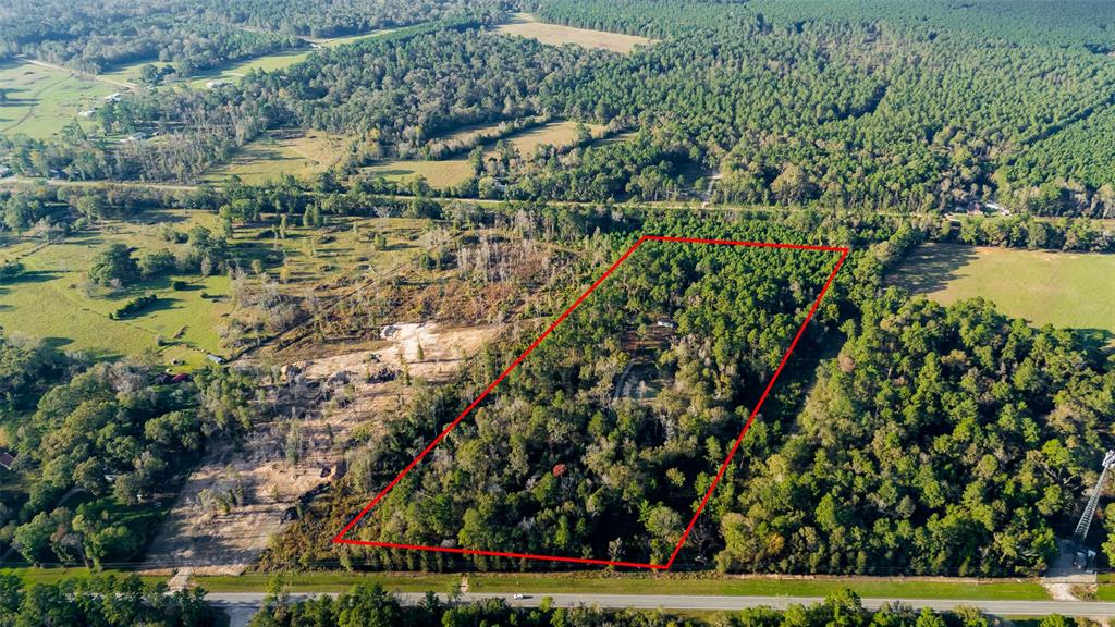 Discover the perfect 5-acre lot for your dream home or business! Only 10 mins from Downtown Cleveland, on FM 787 with no traffic. Not in a flood zone. Great growth potential!