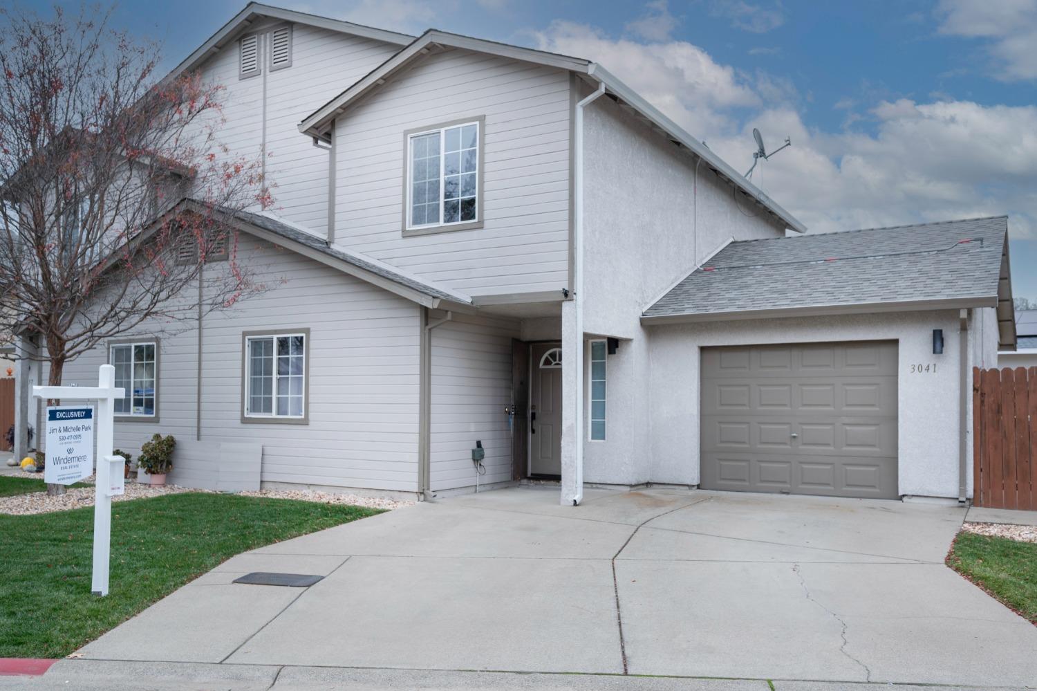 a front view of house with yard